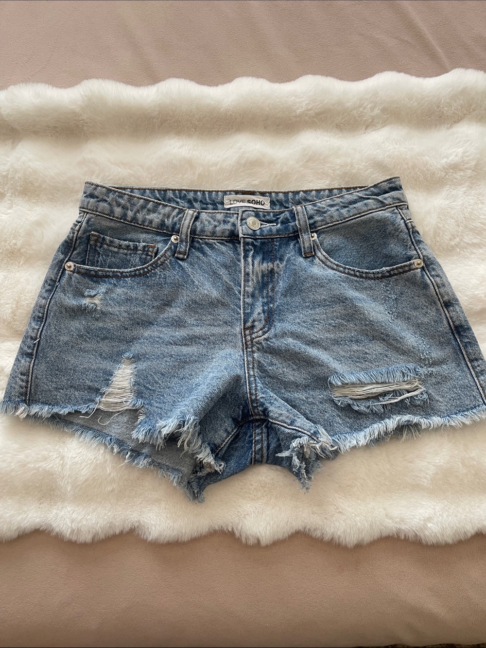 Women's Light Blue Distressed Denim Shorts